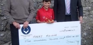 Cheque boost for young cricketer Harry