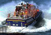 Tenby’s lifeboat crew assists paddleboarders in difficulty