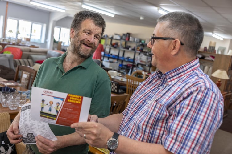 Wales & West Utilities Tom Robinson with Pembrokeshire FRAME’s Fuel Poverty Officer, Frank Farrer