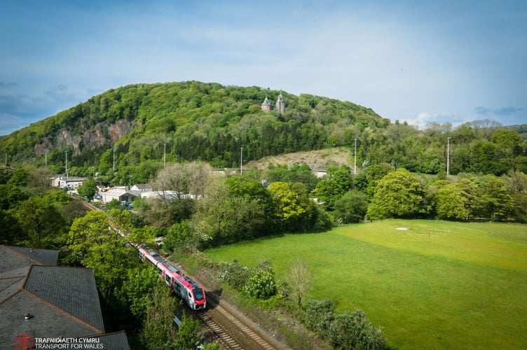 TfW train travelling through Welsh countryside
