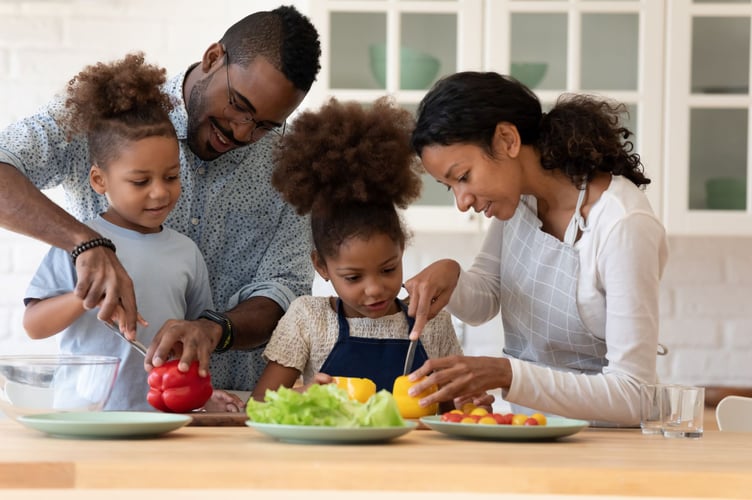 Image of family preparing healthy food