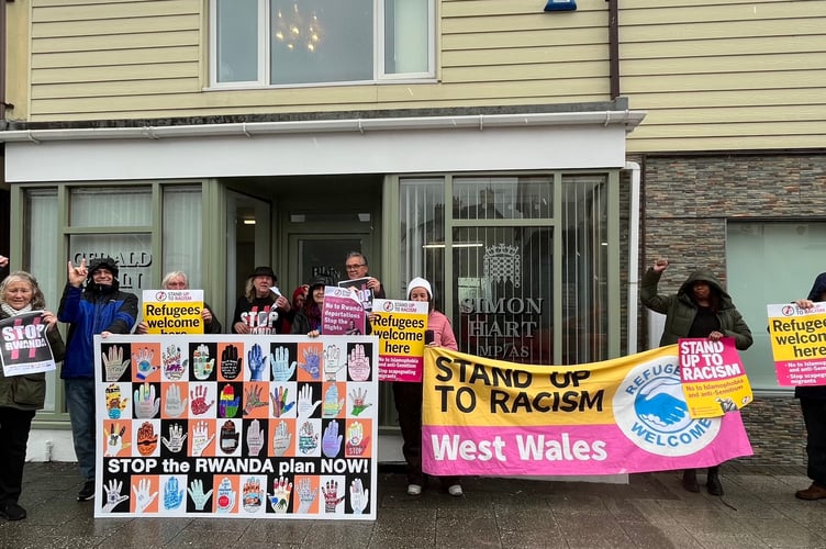 Stand up to Racism protesters outside Simon Hart’s office in Whitland