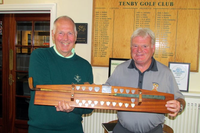Captains Mick Seal (Tenby) and Rob Stevens (Ashburnham) with The Putter