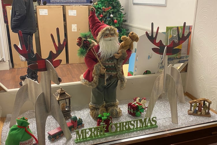 Christmas window at Pembroke Dock taeaway