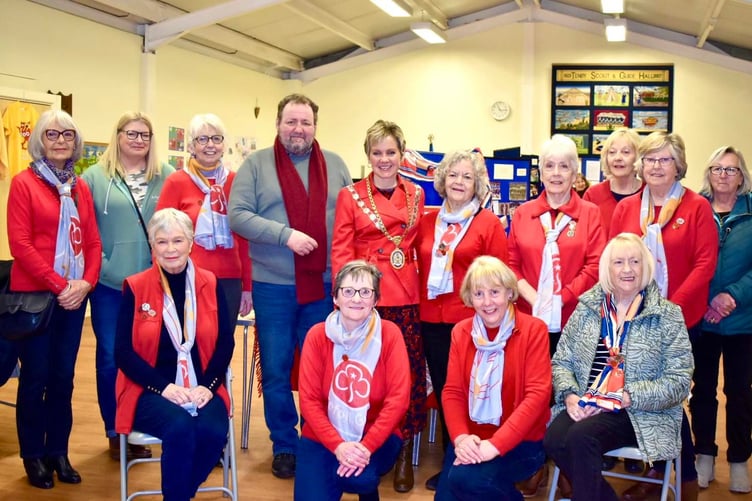 Mayor of Tenby Sam Skyrme-Blackhall with her husband Laurence and some of the organisers of the Girl Guiding centenary exhibition