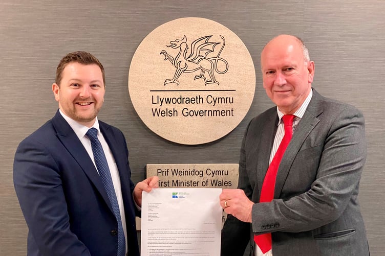 Samuel Kurtz MS and David Rees MS delivering the letter to the Office of the First Minister.