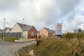 Reduced community payments for estate which built fewer houses