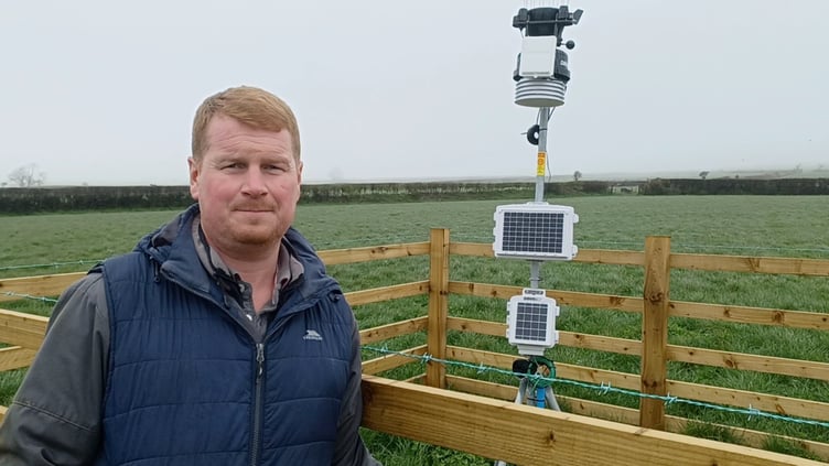 Michael Williams with the new weather station at Fagwr Fran East Farm in Pembrokeshire