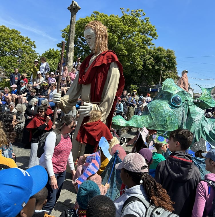 A giant statue of St David and a sea monster, both created by Small World Theatre, led the parade at the Pilgrim Festival in the UK’s smallest city.