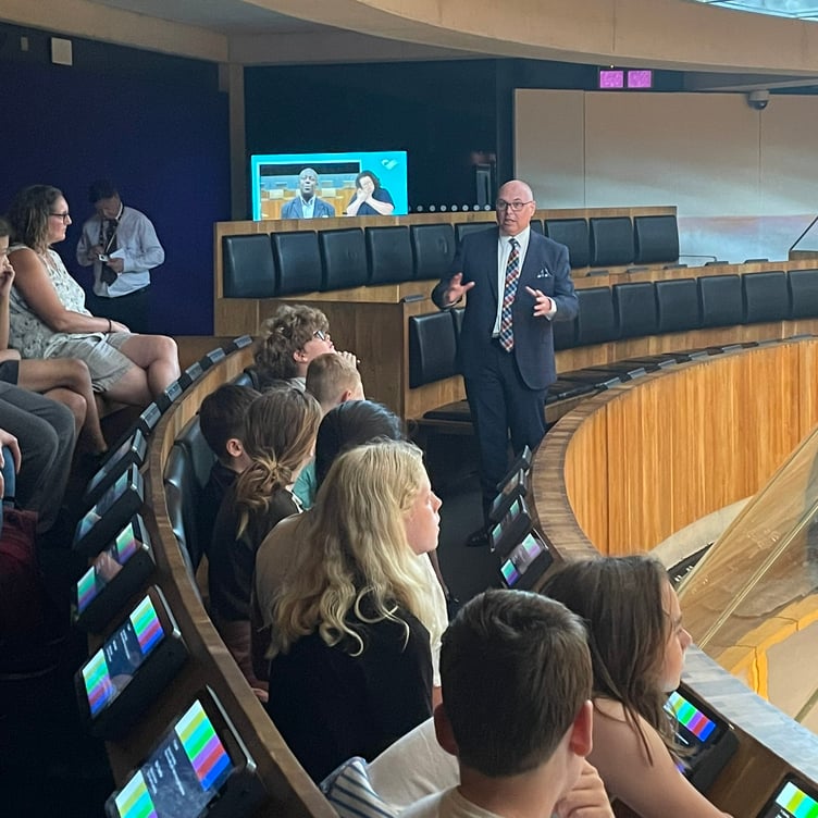 Paul Davies MS talking to pupils from Roch School on their visit to the Senedd