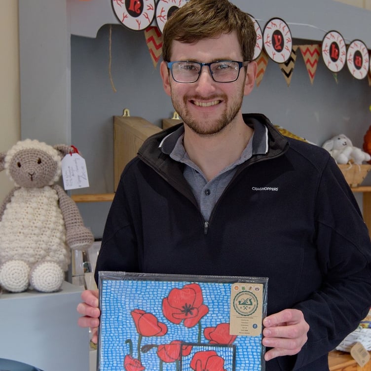 Gethin, One of the Station Shop makers with his artwork