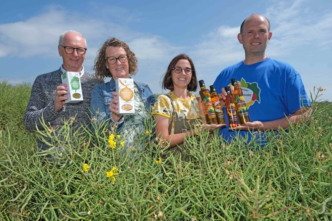 Peter Thomas and Allie Thomas of Cradoc's Savoury Biscuits with Kim and Harry Thomas from Pembrokeshire Gold who are collaborating to create new opportunities for their products and increase the health benefits for customers.