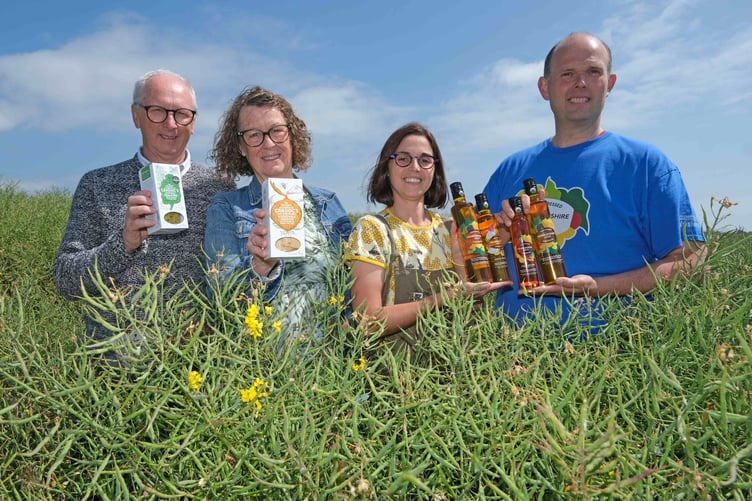 Peter Thomas and Allie Thomas of Cradoc's Savoury Biscuits with Kim and Harry Thomas from Pembrokeshire Gold who are collaborating to create new opportunities for their products and increase the health benefits for customers.