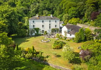 Georgian mansion for sale sits in "iconic" National Trust woodland