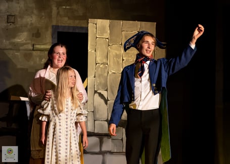 Thenardier, Mme Thenardier and Young Cosette (Ethan Clancy; Claire Hooper-Rees; Charlotte Baxter)