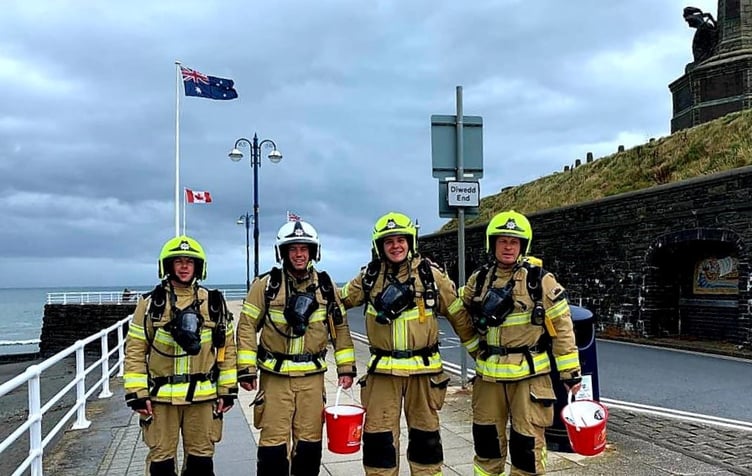 Carwyn, Dewi and Tom from Aberystwyth Fire Station and Owain from Carmarthen Fire Station get ready for their marathon fundraiser challenge
