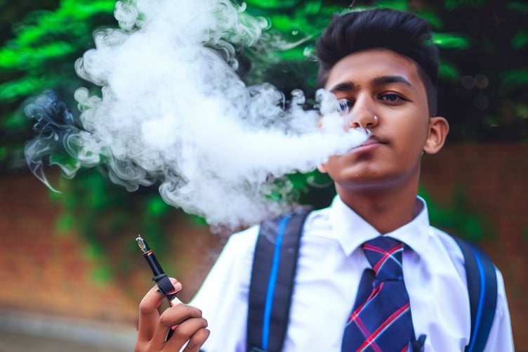 Schoolboy vaping
