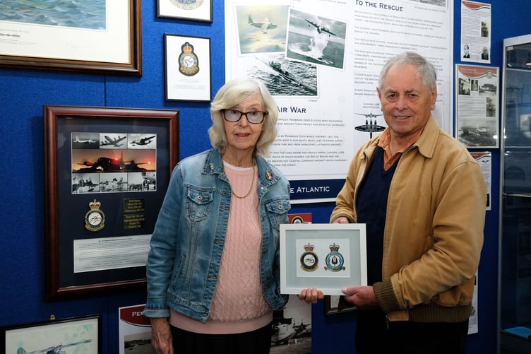 During her visit to Pembroke Dock Heritage Centre Maureen Kutner was presented with a framed copy of the Crests of both No 10 Squadrons, RAF and Royal Australian Air Force, by John Rattenbury of the 10 Squadron RAF Association.