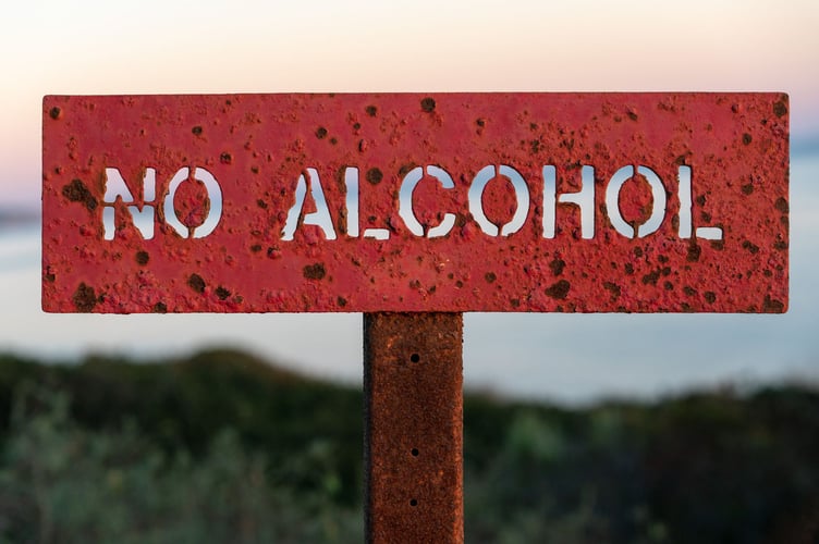No alcohol Photo by Roberto Vivancos: https://www.pexels.com/photo/a-red-text-signage-4796587/