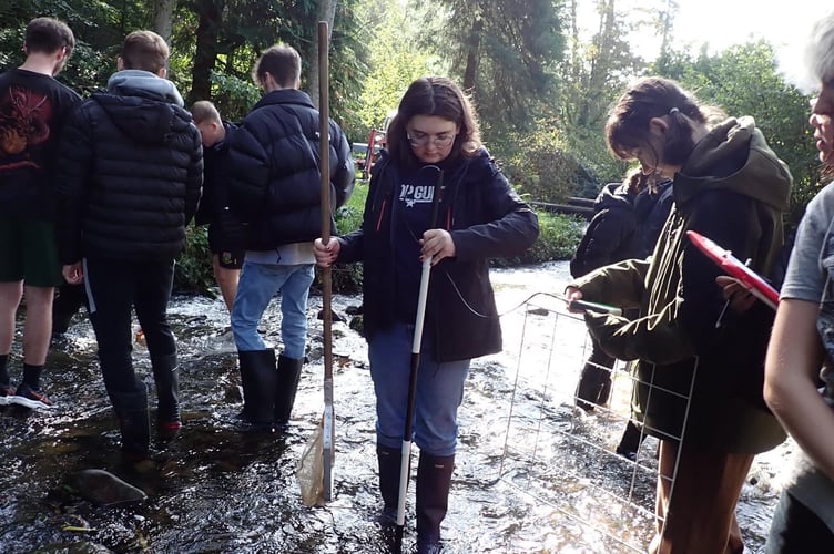 Ysgol Harri Tudur students measuring Colby river speed