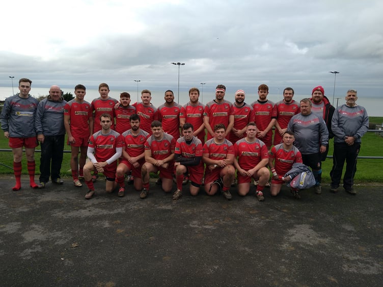 Pembroke First XV squad and coaching team.