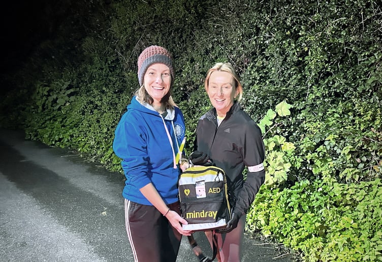 Accord’s PA Tracy Morris presenting the life-saving defibrillator to Event Director Karen Lewis at Saturday’s parkrun fundraiser