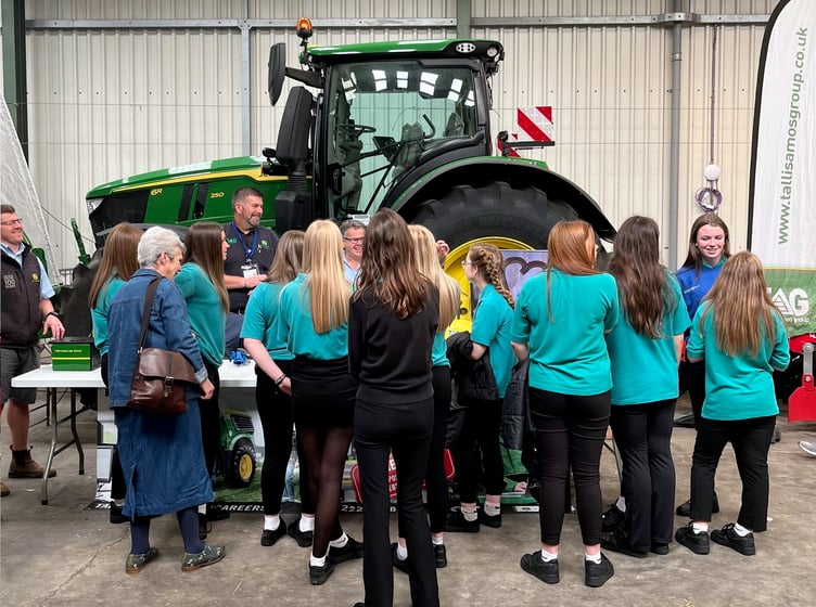 School children learning how machinery is used in food production