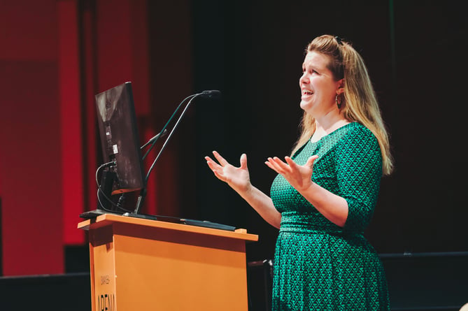 Dawn Lyle speaking in the opening session