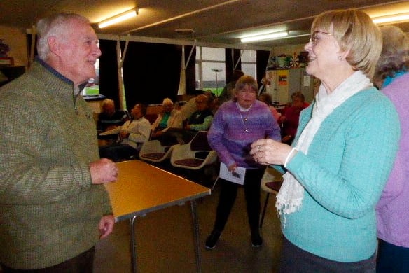 RAF Winchman Rob Griffiths talks to a member of Tenby Friendship Club