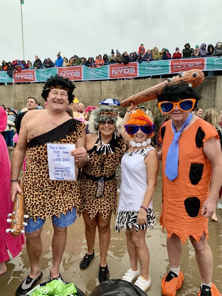 ‘Cavemen‘ Helen and Tony Hedley and friends at the New Year’s Day Swim in Saundersfoot.