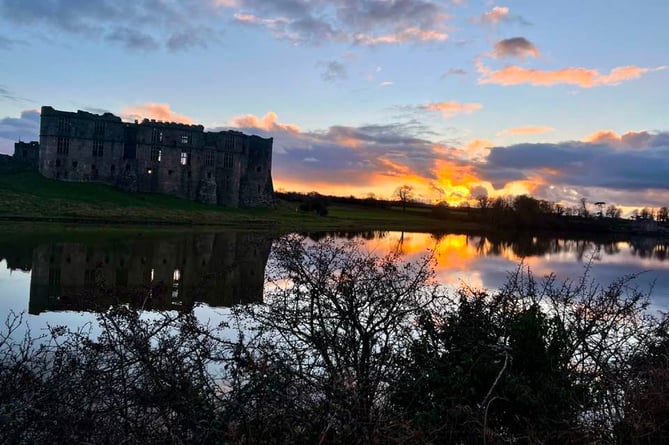 Carew Castle 'on fire' in sunset