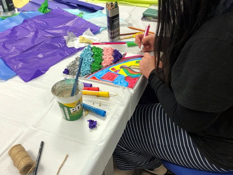 A member of Hywel Dda staff enjoying creative activities