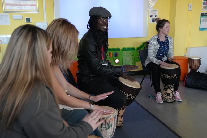 Lox with childcare learners at the drumming workshop