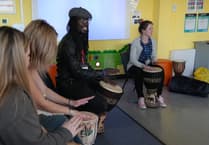 Childcare students in inspirational drumming workshop