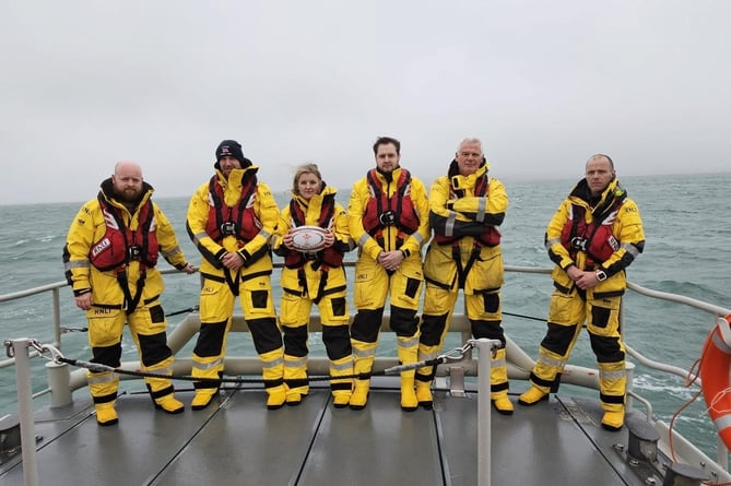 St Davids volunteer crew conduct a minutes silence in honour of the victims of the Harvester tragedy. (Pic. RNLI/St Davids)