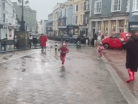 WATCH: Family holds mini pancake race in Tenby