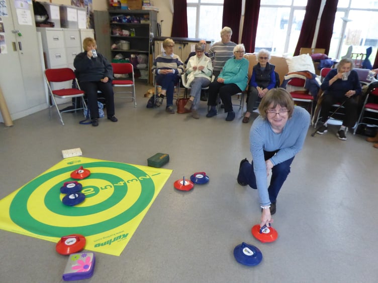 Kurling at Tenby Friendship Club on Wednesday, February 28 - Jeni with the stones.
