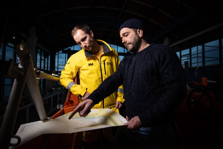 [In the image, left to right: William Horton (Station Mechanic) and Phil John (Station Coxswain).