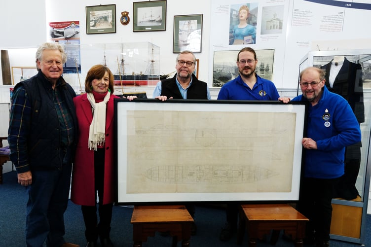 Ian and Christine Jacob hand over the Warrior engraving to Pembroke Dock Heritage Centre team members Trevor Clark, David Howell and John Evans.
PICTURE: Martin Cavaney Photography