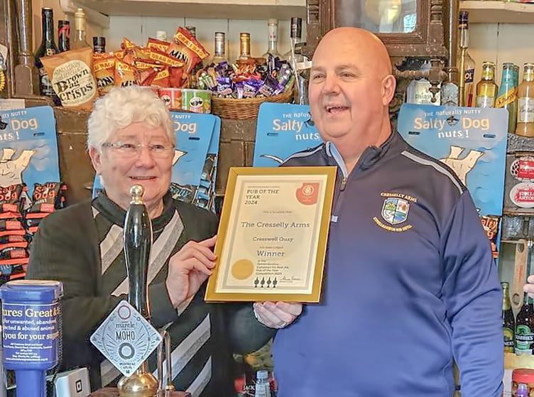 Pembrokeshire CAMRA chair Alwen Thomas presents Cresselly Arms landlord Steve Adams with his ‘Pub of the Year’ certificate.