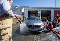 RNLI fundraising car wash at Tenby Fire Station