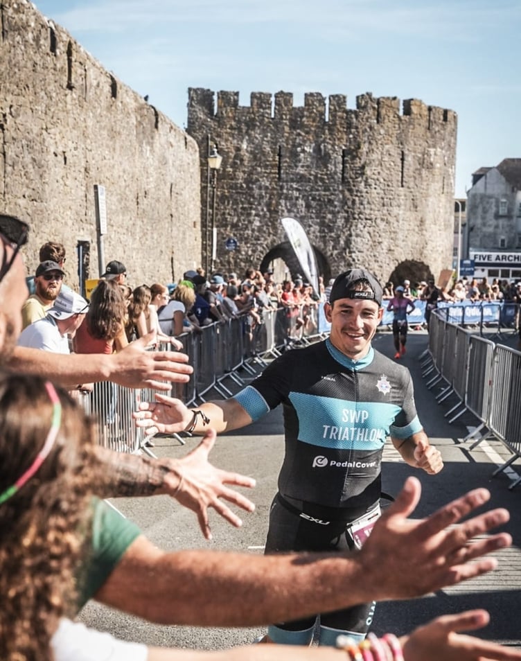Rhondda Police officer Jamie Davies in Tenby during Ironman Wales