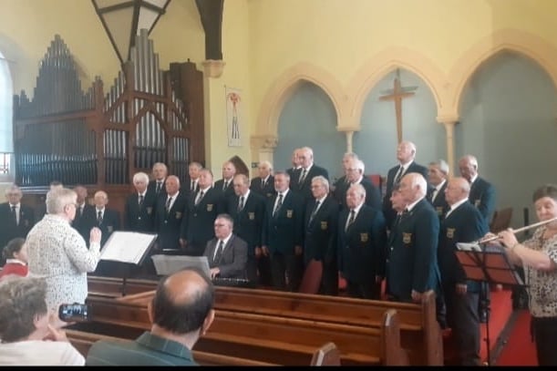 Pembroke and District Male Voice performing at St John’s Church, Tenby, with Musical Director Juliet Rossiter, Accompanist Peter Griffiths and Flautist Alyson Griffiths.