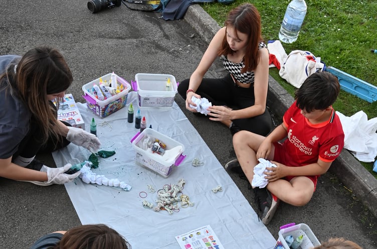 Young people enjoy tie-dye activities at Under the Bridge