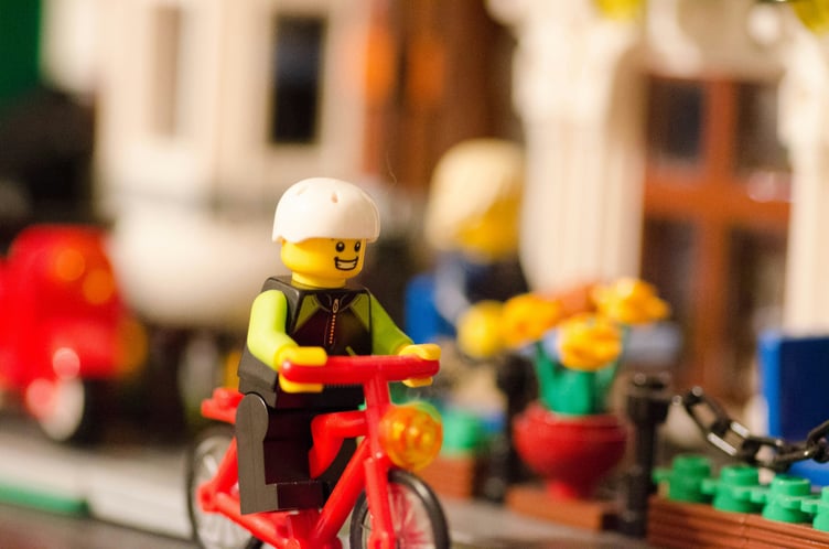 Lego minifigure on bicycle