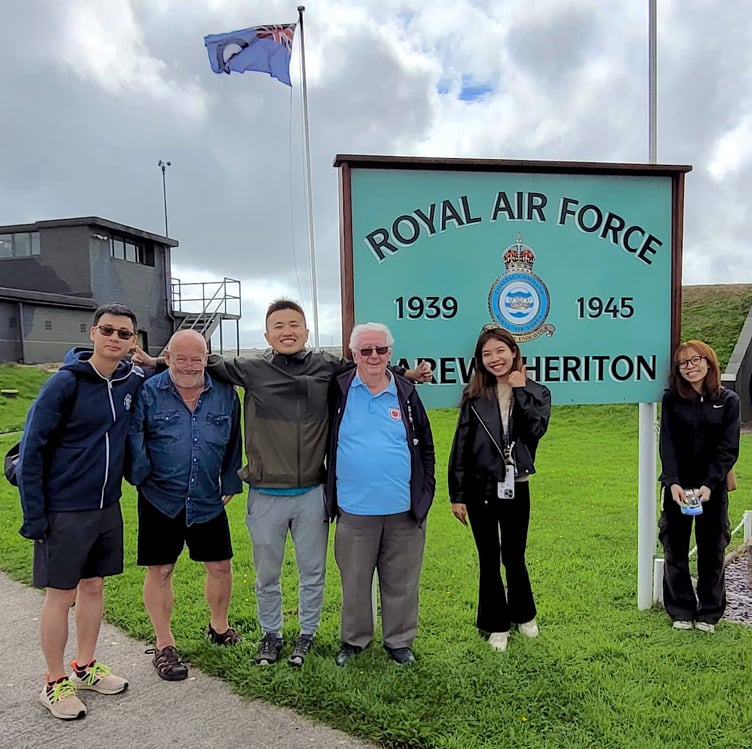 Visitors to Carew Cheriton Control Tower Museum with group members Carl Lawton and Keith Hamer