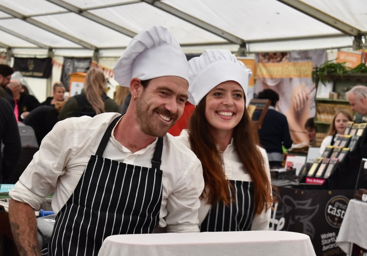 Two smiling chef entertainers (2023)