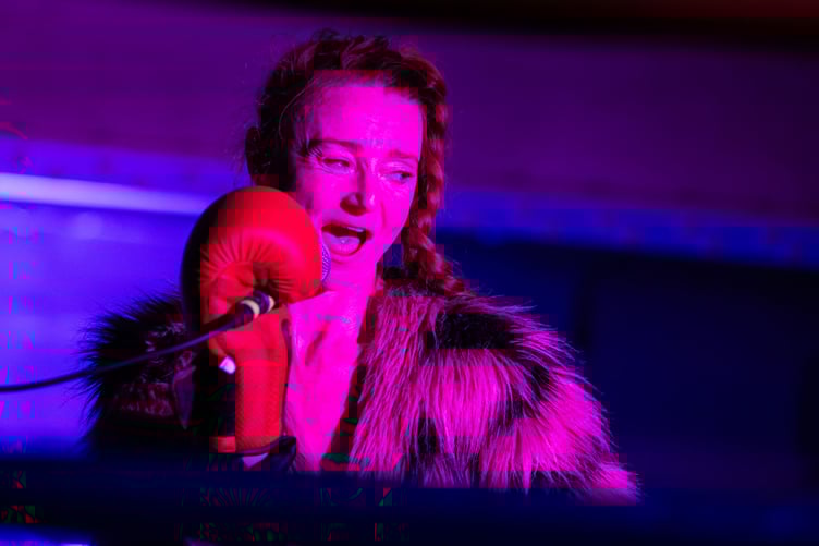 Frankie Walker performing in 'Angry Snatch', a solo physical theatre, dance and storytelling show held in a boxing ring, addressing reclamation and recovery from intimate partner abuse, held at Port O'Leith Boxing Club in Trinity, Edinburgh, as part of the Edinburgh Fringe Festival on 18 August 2024 © Chantal Guevara. All rights reserved.