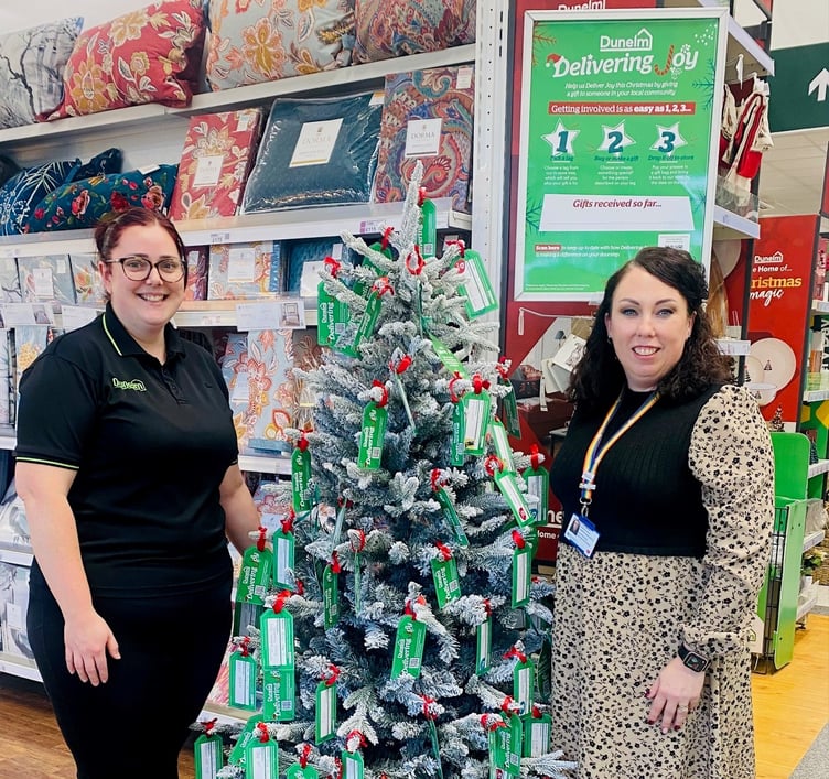 Jo Cheswick from Dunelm and Hywel Dda Charities Fundraising Manager Tara Nickerson launching the store’s Christmas 2024 Delivering Joy campaign, which will support the Wish Fund and bring festive joy to children across West Wales.
