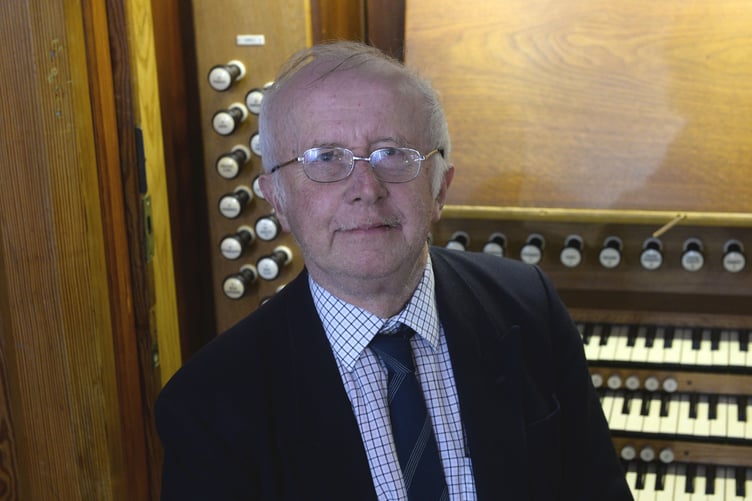 The late Dr John Harrison at the organ of St Mary’s Church, Tenby